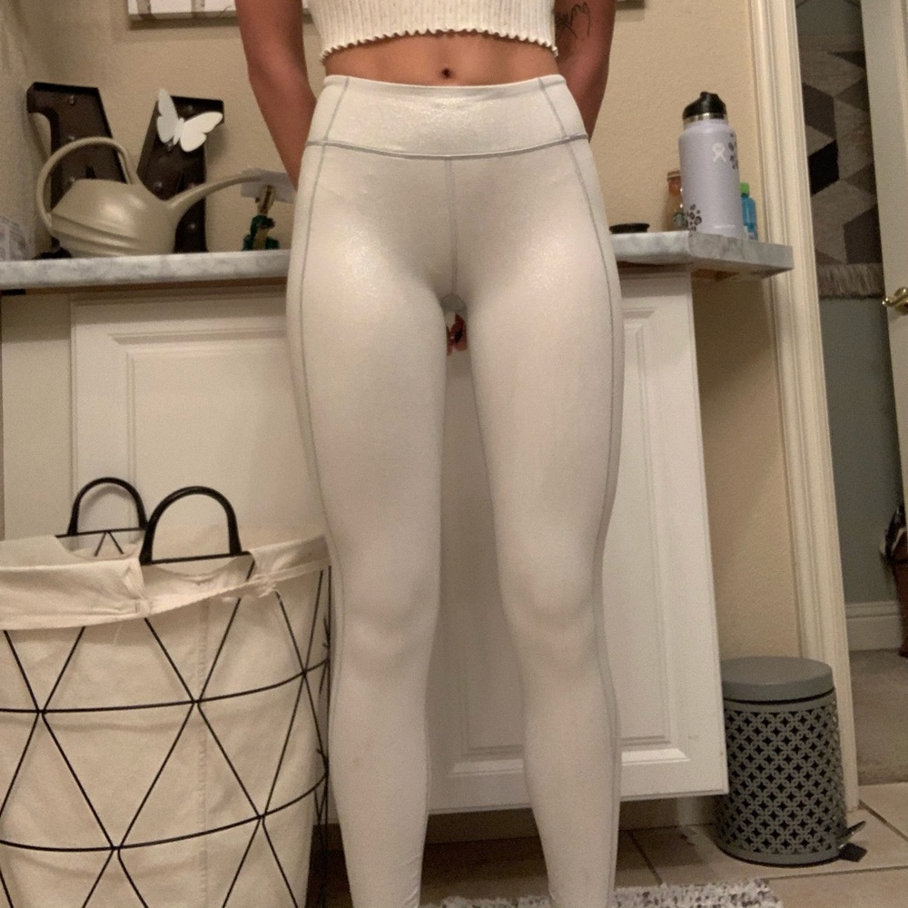 Shimmery white leggings.